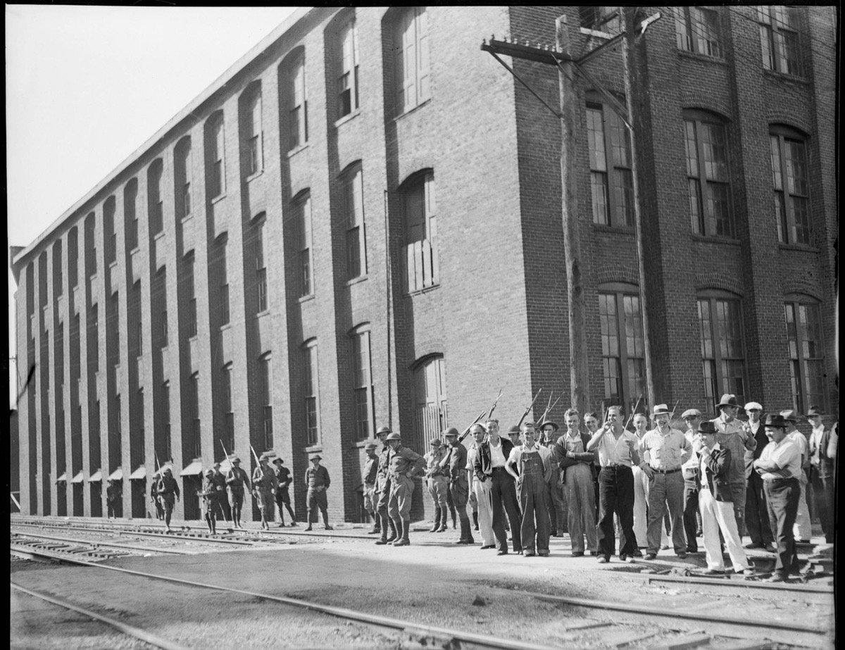 National Guardsmen dispersing striking textile workers outside the Fulton Bag and Cotton Mill, 1934