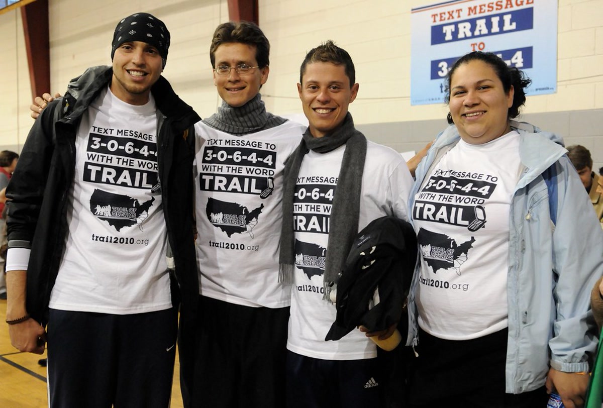 Trail of Dreams organizers and walkers at a community event in Atlanta wearing campaign shirts.