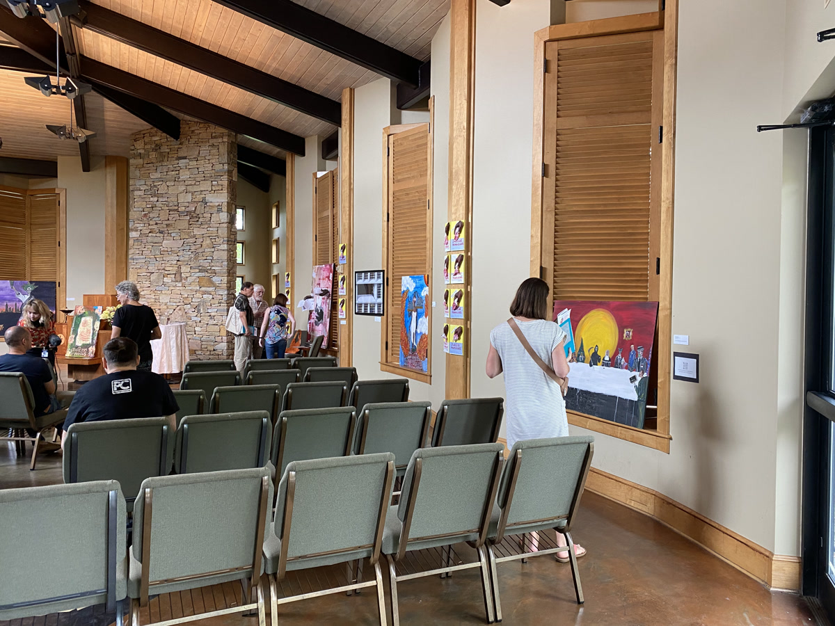 Congregation members explore the installation at the Unitarian Universalist Church of Birmingham, Alabama.