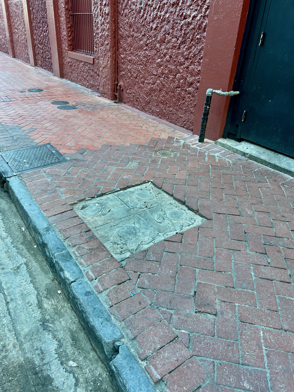 The space where the memorial plaque used to be after having been stolen in 2024